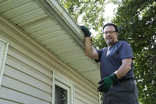 Gardner Gutter Cleaning workers